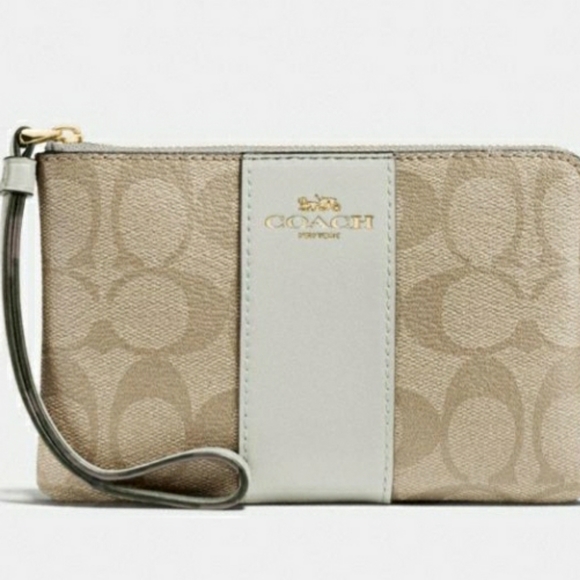 Coach Handbags - COACH - Corner Zip Wristlet in Signature canvas